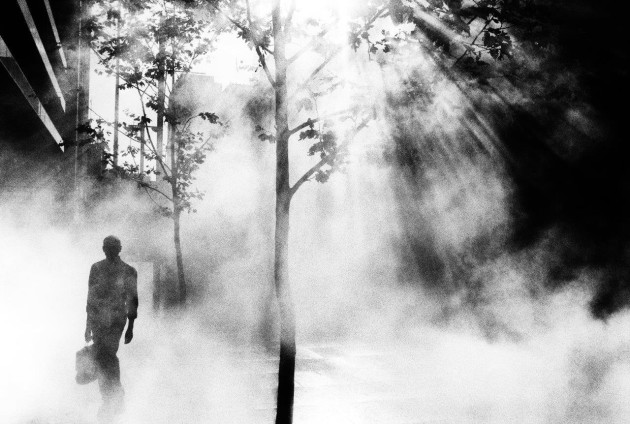 © Trent Parke. An office worker on his way to work walks through Martin Place, Sydney. From the series, Dream/Life.