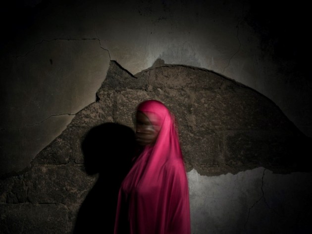 © Adam Ferguson. Fatima, 16. “I didn’t want a situation where I’m the reason anyone dies.” From the series, The Bombs They Carried.