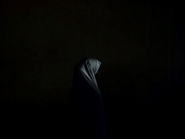 © Adam Ferguson. Fati, 14. “They told me to go to the big mosque and sit among the worshipers.” From the series, The Bombs They Carried.