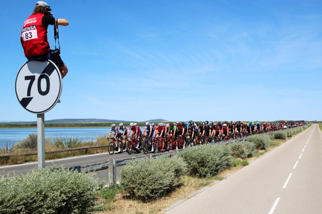 Going above and beyond to find creative unique images at Vuelta Espa&ntilde;a. I often shoot with two bodies, one with a telephoto for distance and a wide angle for when the pack are close up. Image: Marcus Enno