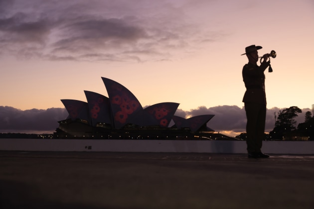Australia Marks Remembrance Day 2020. A bugler is seen with the sails of the Opera House in the background on November 11, 2020 in Sydney, Australia. Remembrance Day 2020 marks 102 years since the Armistice that ended the First World War on 11 November 1918. Almost 62,000 Australians died fighting in four years of global conflict. On this day Australians observe one minute's silence at 11 am to honour those who have served and those who have died in war and on peacekeeping and humanitarian operations.