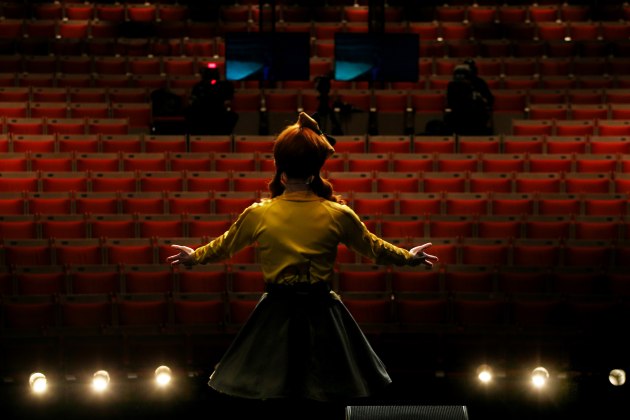 The Wiggles Perform At Sydney Opera House For Audiences Live Streaming At Home. Emma Watkins of The Wiggles performs on stage during a live-streaming event at the Sydney Opera House on June 13, 2020 in Sydney, Australia. The Sydney Opera House has launched a new digital initiative to allow audiences to watch performances at home while the Opera House remains closed due to COVID-19 restrictions. As part of the 'From Our House to Yours' program, the Sydney Opera House is recording performances on-site to broadcast to audiences at home around the world. The Sydney Opera House announced the cancellation of public performances on 17 March 2020 in response to the COVID-19 outbreak.