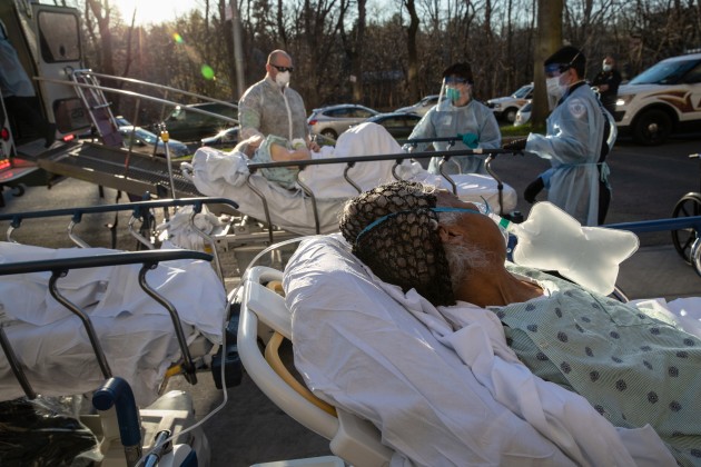 © John Moore/Getty images. COVID-19 patients arrive to the Wakefield Campus of the Montefiore Medical Center on 6 April, 2020 in the Bronx borough of New York City. A specialized bus known as a Medical Evacuation Transport Unit (METU) caries patients on stretchers and benches.