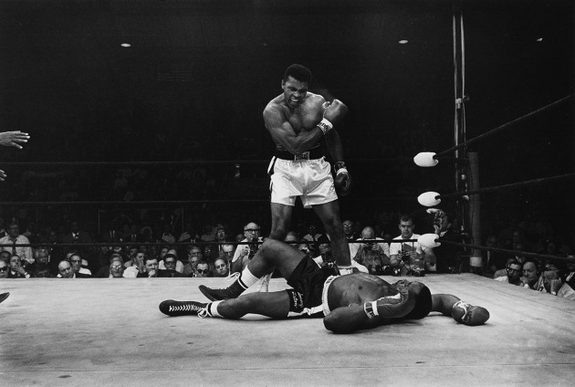 AP Photo/John Rooney. Heavyweight champion Muhammad Ali stands over fallen challenger Sonny Liston, shouting and gesturing shortly after dropping Liston with a short hard right to the jaw, at 1:44 in the first round of their bout at the Central Maine Youth Center in Lewiston, Maine, United States on 25 May 1965.