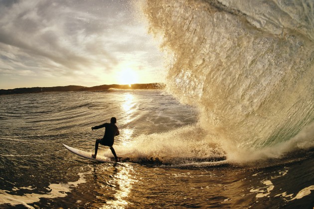 © Russel Ord. Jason Loof getting a very unique perspective of the Western Australian sunrise surfing the infamous Margaret River main break.