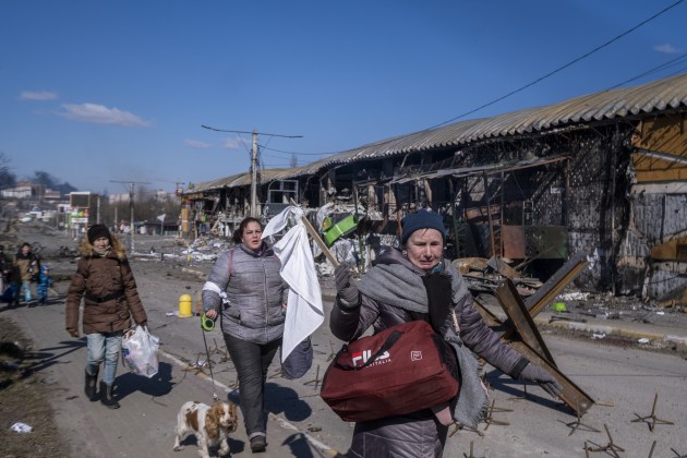 © Ron Haviv/VII. Ukrainians flee as the Russians advance into Irpin, Ukraine, 10 March, 2022.